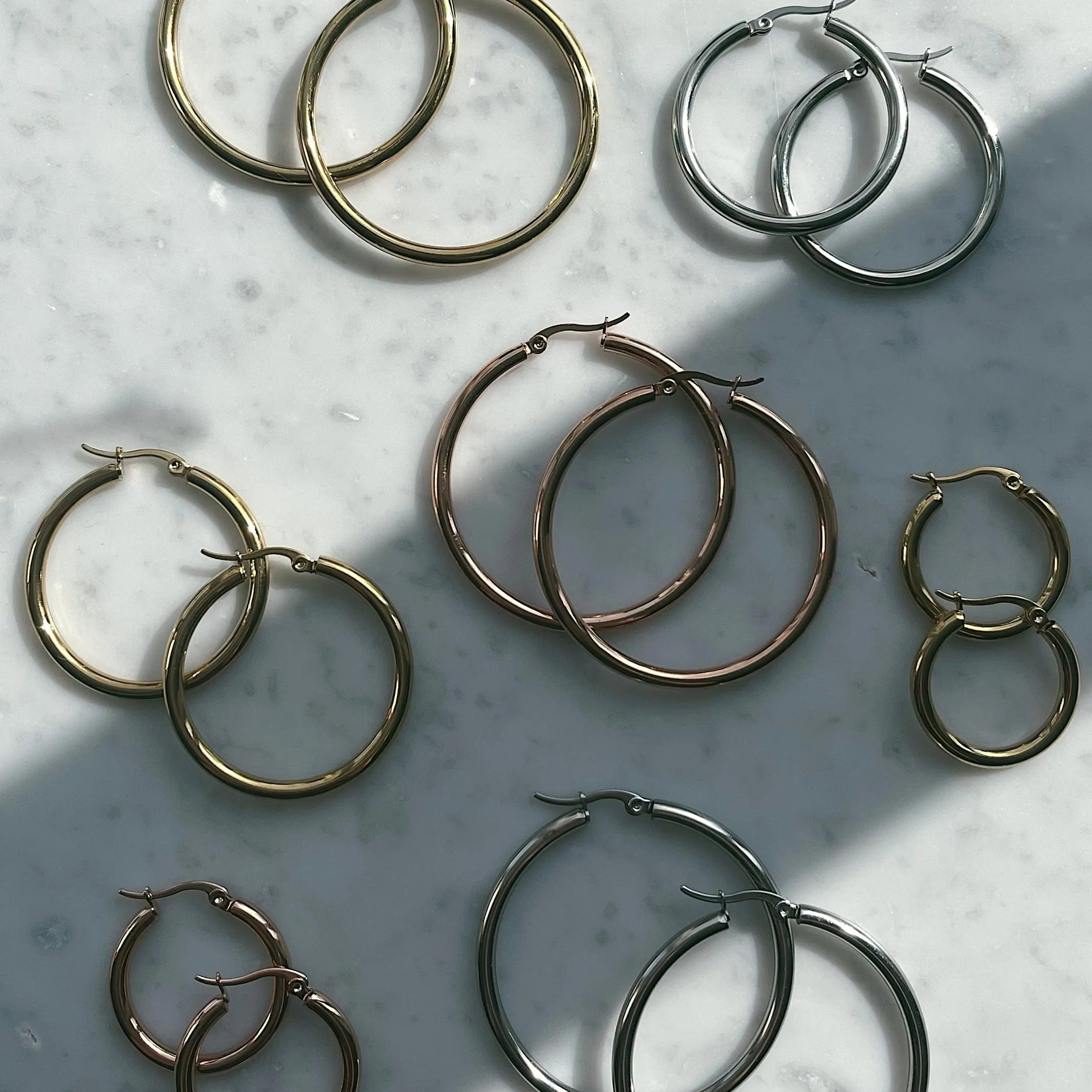 Exude Hoop Earrings