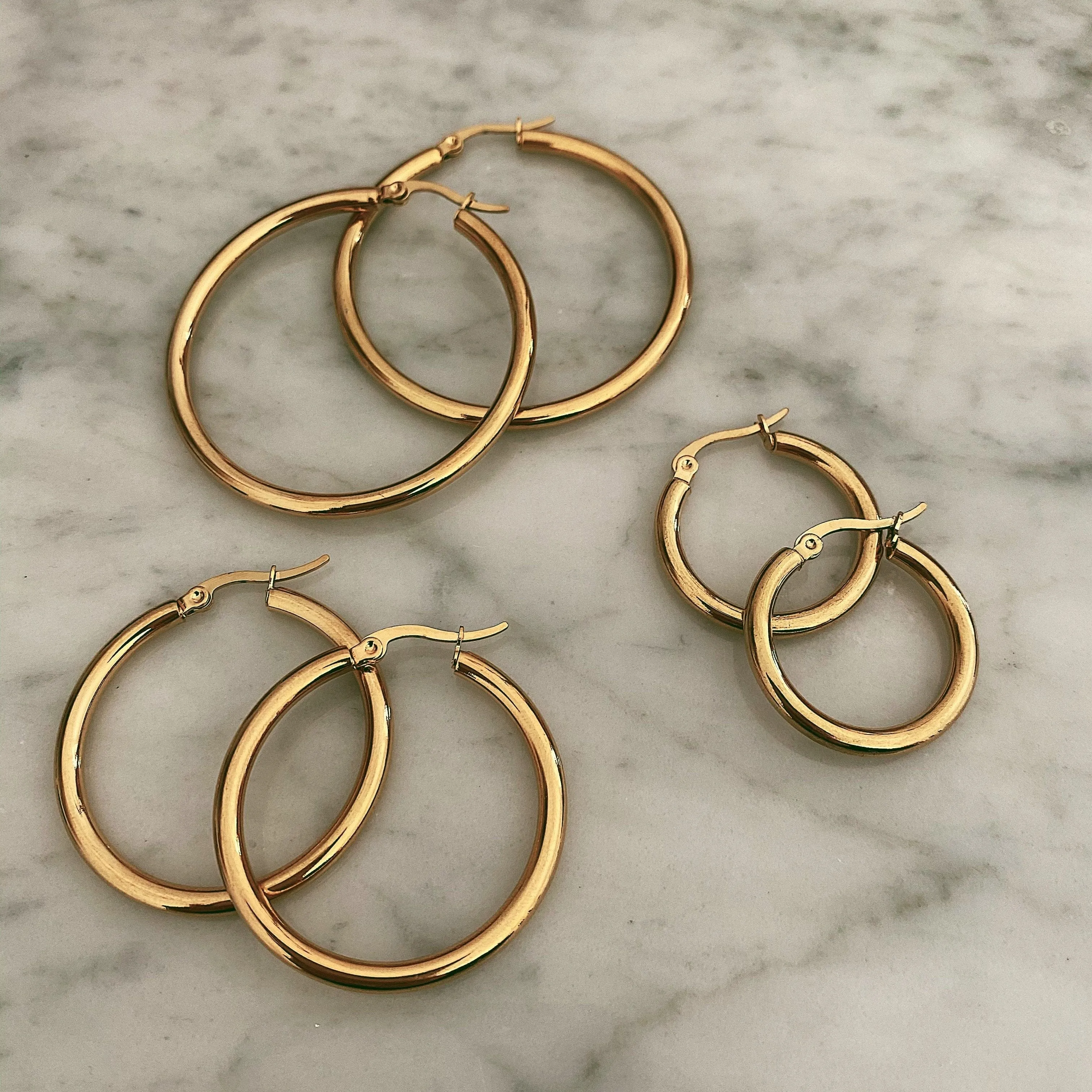 Exude Hoop Earrings