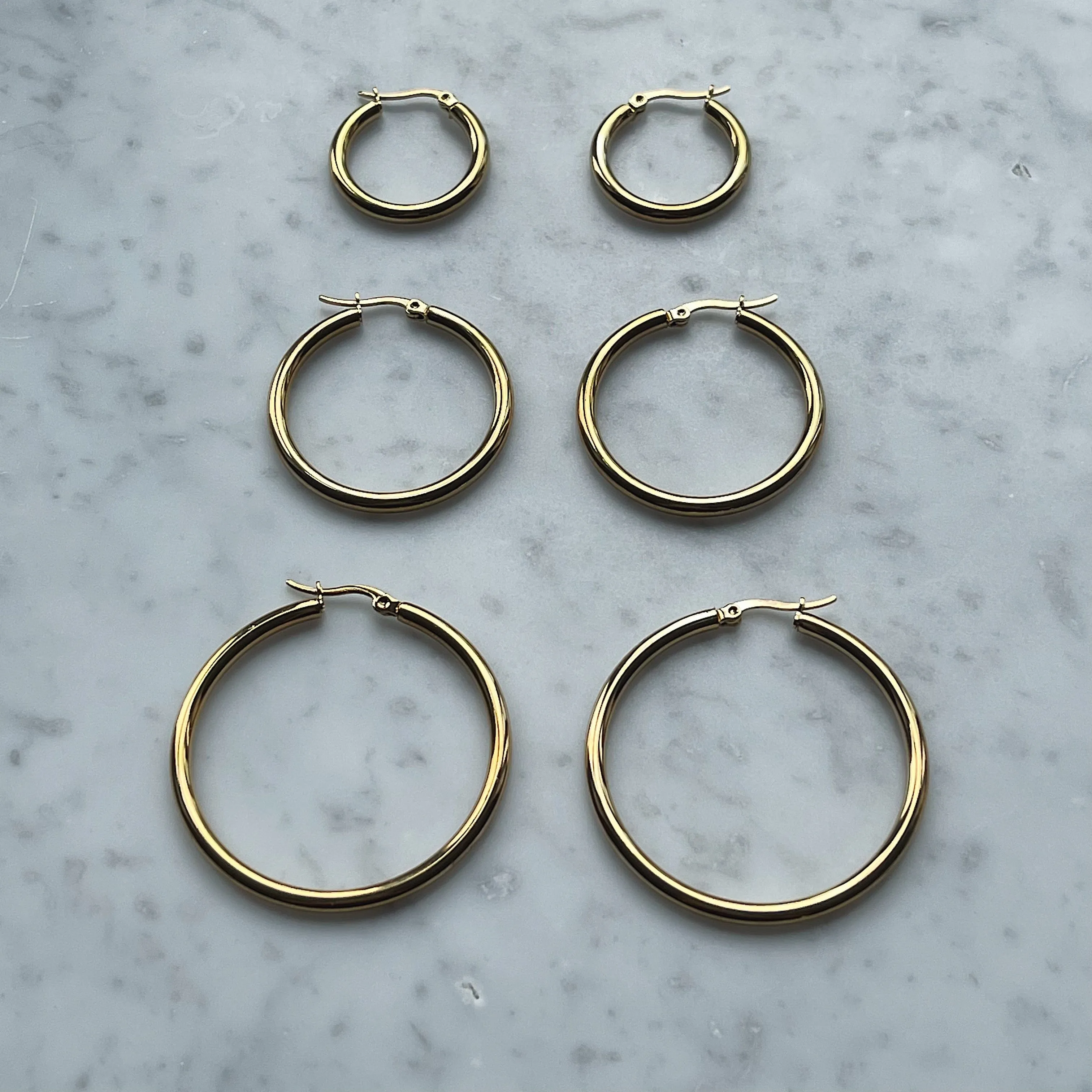 Exude Hoop Earrings